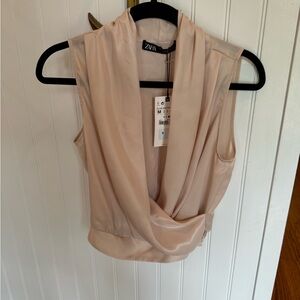 Zara cross sleeveless blouse. New with tags. Size medium